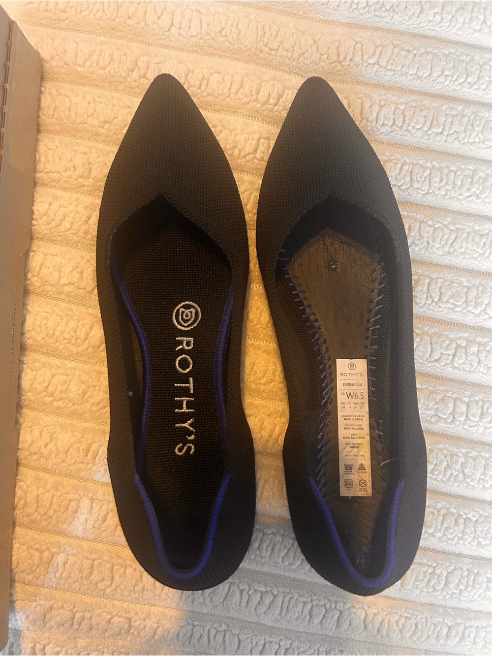 Rothy's Black Pointed Knit Flats with Deep Blue Trim